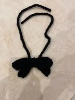 黒いリボン型犬用アクセサリー