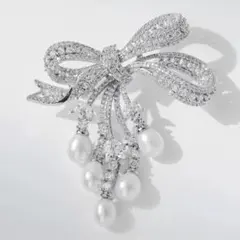 スワロフスキージルコンリボンブローチ淡水真珠コサージュ結婚式入学式卒業式記念日