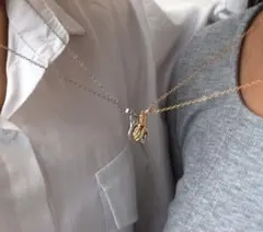 ペアネックレス レディース おそろい カップル シルバー 握手 ハート メンズ