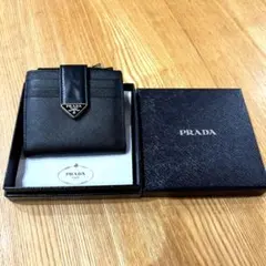 美品PRADA プラダ二つ折り財布サフィアーノレザー　トライアングルロゴプレート