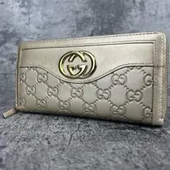 GUCCI インターロッキングGG シマレザー ラウンド 長財布 ゴールド