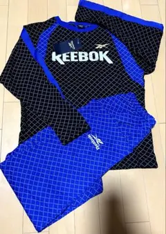 【未使用タグ付き】Reebok パジャマ 150ブラックとネイビー　キルト生地