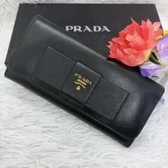 極美品✨プラダ 長財布 折り財布 レザー サフィアーノ リボン ゴールド金具 黒