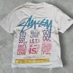 STUSSY ワールドツアー風 ロゴTシャツ S/M 古着 メンズ/レディース