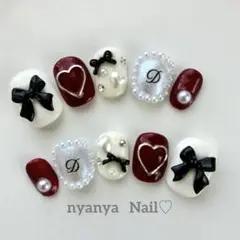 お色変更＆サイズ変更無料♪ ベリーショート　黒いリボンのハートネイル♡
