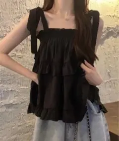 ブラックフリルノースリーブトップス