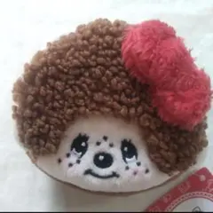 新品 モンチッチ ハローキティ フェイスミニポーチ