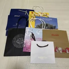 ショップ袋セット（Swarovski, Godiva, Sanrioなど）