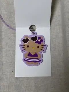 日焼けキティ パープル　ラバーストラップ チャーム ハローキティ セリア