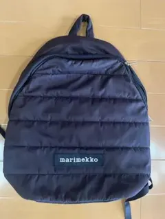 marimekko ブラック キルティングリュック - メルカリ