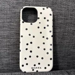 iPhone15 アプリコットベースに黒の小さな花柄ケース