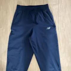 Sサイズ ニューバランス NB ウーブンパンツネイビー 裾ファスナーのサムネイル