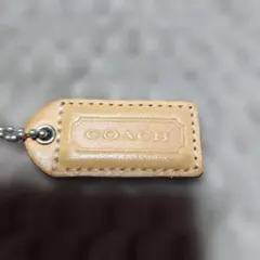 ✨美品✨COACH ベージュレザー ロゴタグ チャーム