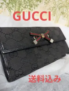 GUCCI【美品】定価11万9000円　ブラック 二つ折り財布 リボン付き