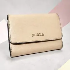 300円～ FURLA フルラ バビロン 三つ折り財布　ピンク ベージュのサムネイル
