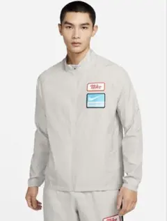 NikeナイキDF DYEマイラー ジャケットウィンドブレーカー ベージュグレー