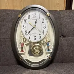 CITIZEN 振り子付きオーバル型掛時計