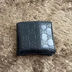 GUCCI グッチ 二つ折り財布 ブラック GG柄のサムネイル