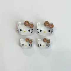 サンリオ日焼けキティネイルパーツマットベージュ茶色リボンハートキラキラ