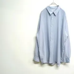 薄い青の長袖シャツ　カジュアル　ポリエステル調　柔らかい　前面ボタン　 L