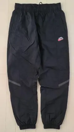 NIKE 筆記体ロゴ ナイロンウーブンパンツ サイズM ※補修アリ