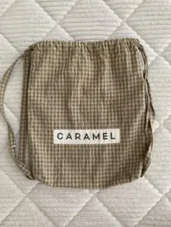 CARAMEL チェック柄 リュック ナップサック CARAMEL チェック柄 ナップザック - メルカリ