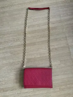 TORY BURCH 赤 ハート模様 クラッチバッグ