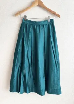 index スカート 光沢あるグリーン