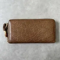 GUCCI GG シマ ラウンドジップ長財布 バンブータッセル - メルカリ