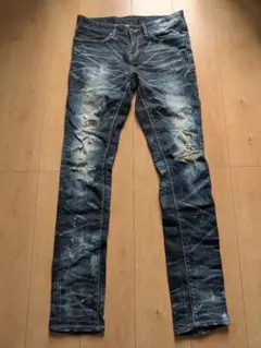 フーガ加工デニムパンツ