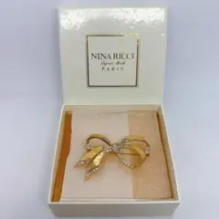 NINA RICCI ニナリッチ リボン ブローチ ゴールドカラー 箱付のサムネイル