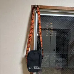 GUESS ショルダーバッグ 黒 オレンジストラップ