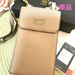 美品！ココセリュクスゴールド！スマホショルダーバッグ（斜めがけベルト付き)