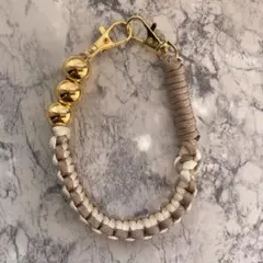 上品ベージュゴールド パラコードストラップ ハンドストラップ 大人可愛い 韓国風