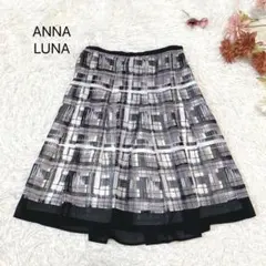 s3152【アンナルナ】膝下 フレア スカート 総柄 チェック柄 シアー 黒系のサムネイル
