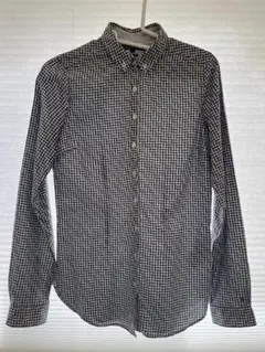 TOMMY HILFIGER チェック柄長袖シャツ。