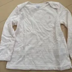 薄いピンクの長袖Tシャツ