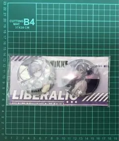 勝利の女神 NIKKE コミケ 冬コミ リバーレリオ 缶バッジ - メルカリ