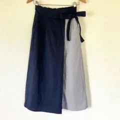 マジェスティックレゴン 切替ストライプ柄フレアスカート リボンベルト ネイビーのサムネイル