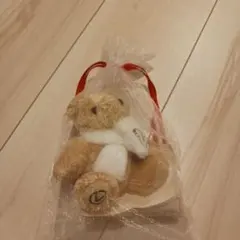 ベージュのぬいぐるみクマ（スカーフ付き）