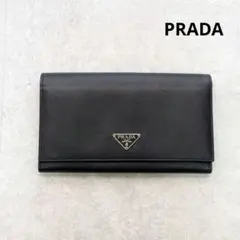 美品✨️プラダ 長財布 サフィアーノレザー 三角ロゴプレート フラップ 黒のサムネイル