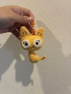 オレンジ色の猫型あみぐるみキーチェーン