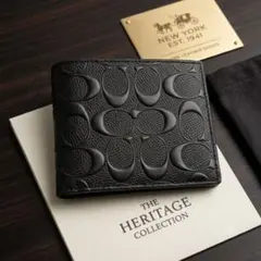 COACH ブラックレザー 二つ折り財布　シグネーチャー　ロゴ　ミニウォレットのサムネイル