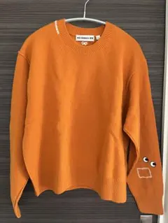 オレンジ クルーネック セーター