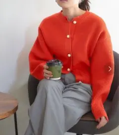 titivate パール釦クルーネックニットカーディガン オレンジ