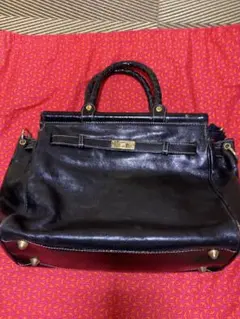 黒レザー ハンドバッグ 編み込みハンドル
