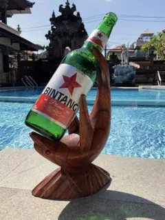 バリ島木彫り 豊穣モチーフ ボトルホルダー アートオブジェ」 - メルカリ