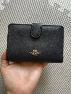 美品✨COACH 二つ折り財布 ネイビーのサムネイル