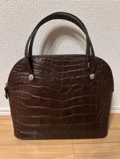 ヴェルサーチ　型押し　クロコ　ハンドバッグ クロコ+バッグ VERSACE(ヴェルサーチェ) - 海外通販のBUYMA