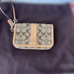 1hセールCoach ロゴポーチ ベージュ/ブラウン 中型